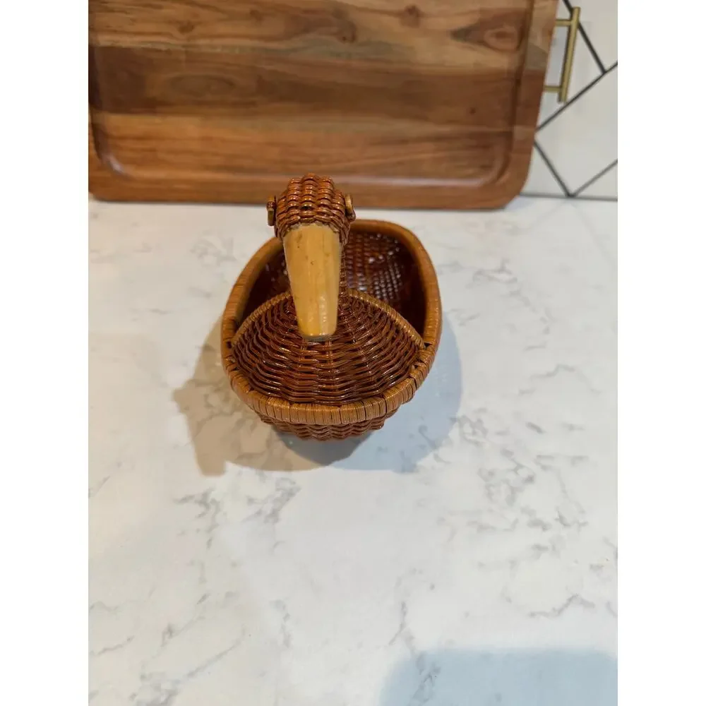 handwoven rattan duck basket elongated oval bowl design integrated duck head